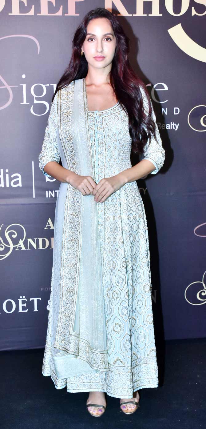 Nora Fatehi looked pretty in a sky blue Anarkali dress which she opted to attend Abu Jani and Sandeep Khosla's success event.
