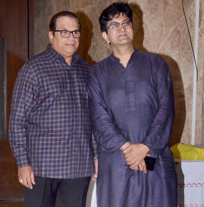 Ramesh Taurani poses with lyricist, screenwriter and the chairman of CBFC Prasoon Joshi at his residence in Bandra.
