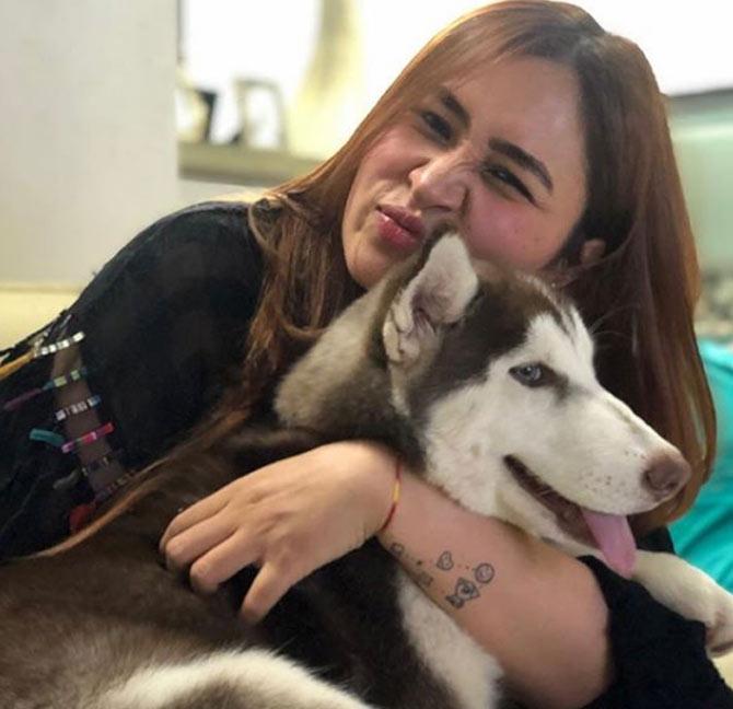 Jwala Gutta shared this photo with her pup and said: The best therapist has fur and four legs #sky #huskyofinstagram #cutiepie #puppylove
