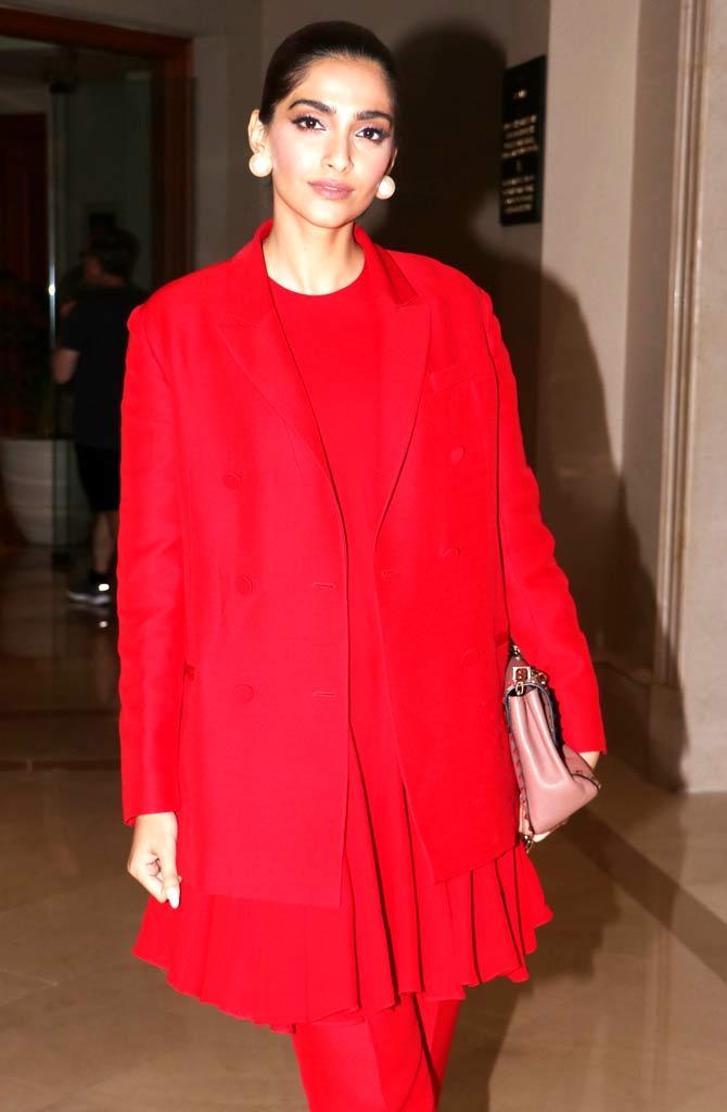 Sonam Kapoor looked chic and stunning in an all-red ensemble at the promotional event. The Veere Di Wedding actress kept her look minimalistic with black mules and statement earrings. 