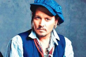 Johnny Depp defends Dior perfume ad: It was made 'with great respect'