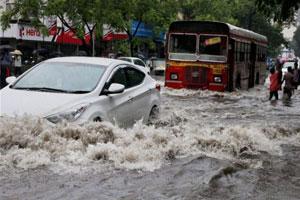 Heavy showers in Mumbai, Thane and Palghar; Railway services disrupted