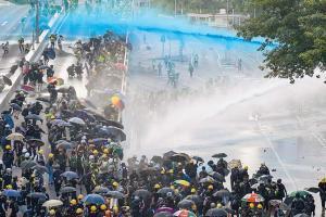 Chaos back in Hong Kong with tear gas and petrol bombs