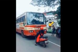 Woman on scooty lauded for not giving way to bus riding the wrong lane