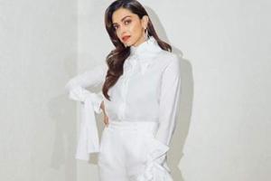 Deepika Padukone is a vision in white posing for the camera