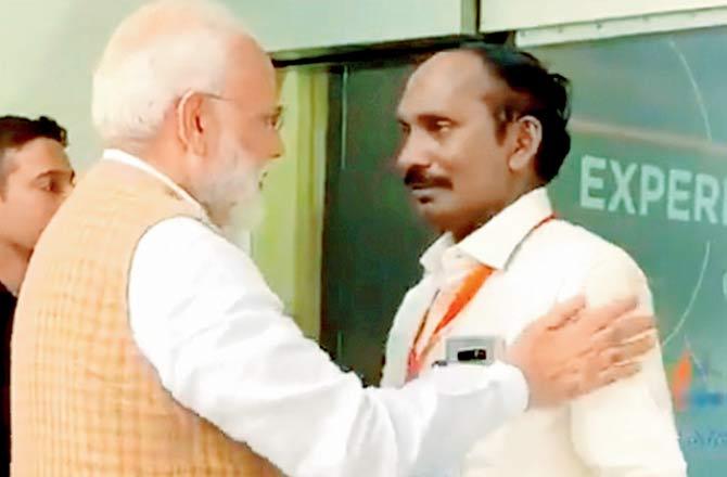 Prime Minister Narendra Modi consoles ISRO chief K Sivan as he got emotional