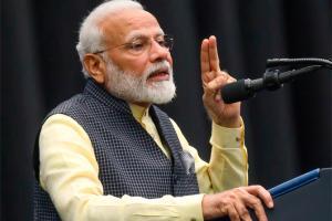 Howdy,Modi!: Narendra Modi lauds Indian community's contribution in boo