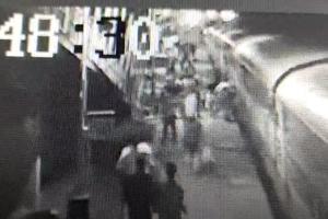 Railway passenger slips catching moving train, alert RPF staff save her