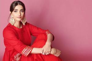 Show off your lucky charm just like Sonam Kapoor in these red dresses