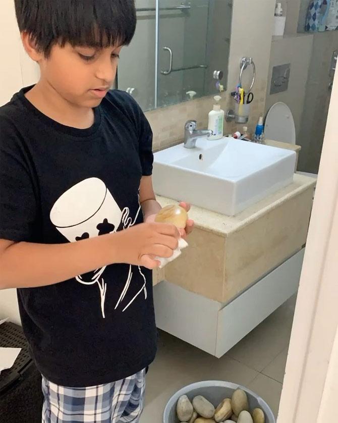She also posted a picture of her son doing some household chores. 