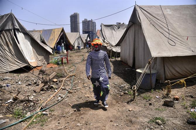In photo: A member of the Rambo Circus group snapped while taking a walk around the circus tent.