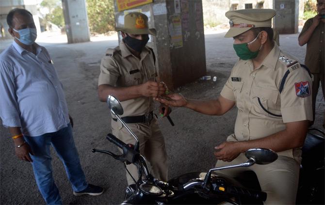 In photo: An RPF constable washes his hand while on duty. 