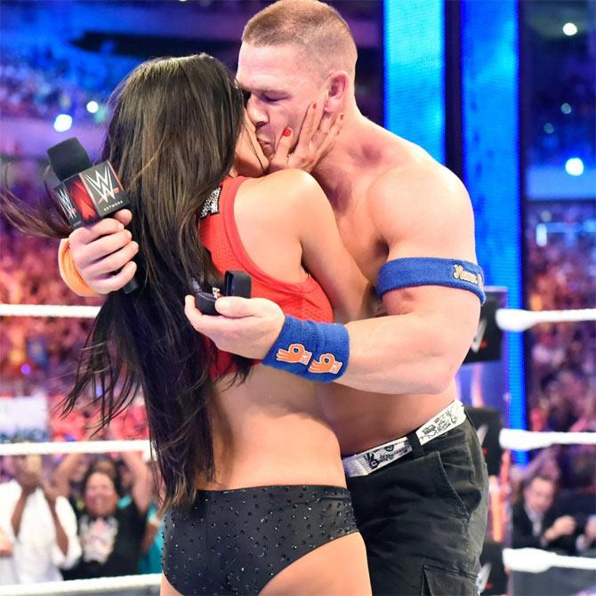 Love and Mania! At WrestleMania 33, couple John Cena and Nikki Bella faced another couple The Miz and Maryse in a mixed tag team match and won. John Cena then proposed to Nikki Bella in dramatic fashion, leaving the crowd smiling away. 