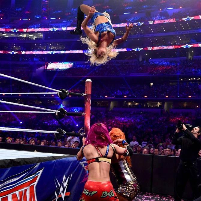History created at WrestleMania 32! The first-ever WWE women's title was up for grabs in a triple threat match involving Charlotte Flair, Sasha Banks and Becky Lynch. Charlotte went on to win the match and the title