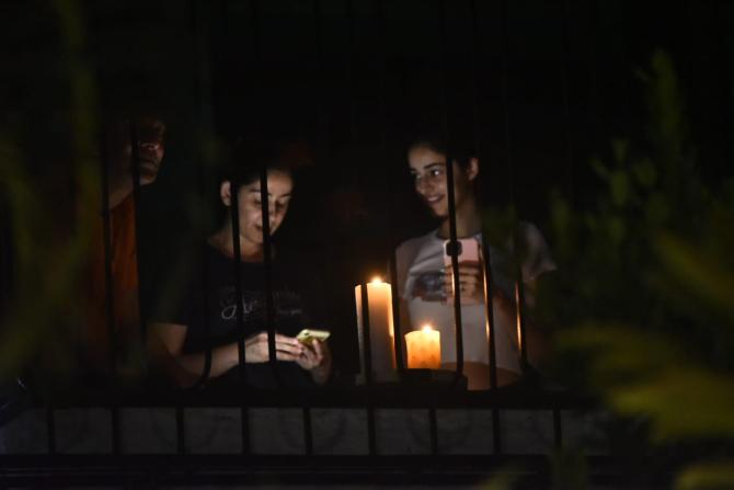 Bollywood actor Ananya Pandey, along with her paents, also showed solidarity and lit candles on their balcony. 