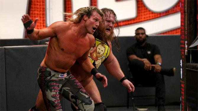 Otis and Dolph Ziggler faced off in what could be called a revenge match after Ziggler stole away Otis' love Mandy Rose, whose partner Sonya Deville would be in Ziggler's corner.