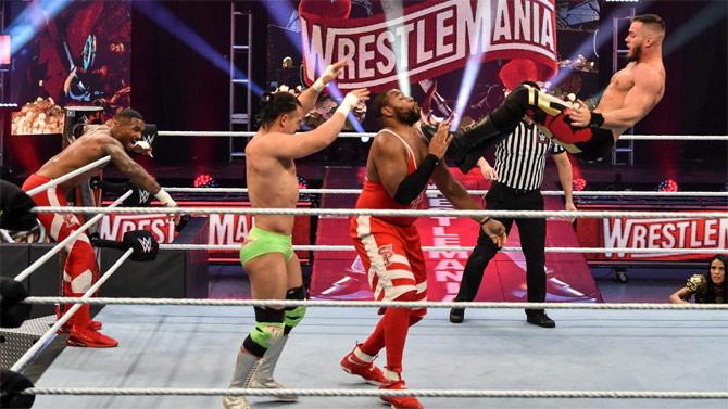 The Street Profits successfully defended the Raw tag team titles against Angel Garza and Austin Theory. Bianca Belair was on the side of Street Profits as they celebrated