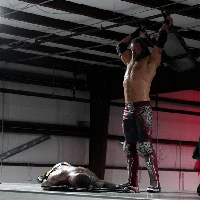 During the closing stages, Edge and Randy Orton moved onto a tow truck and as Randy Orton had Edge down to hit the chair on him, the 'Ultimate Opportunist' put him in a triangle choke and then slammed his head with a chair before picking up a tearful and emotional win.