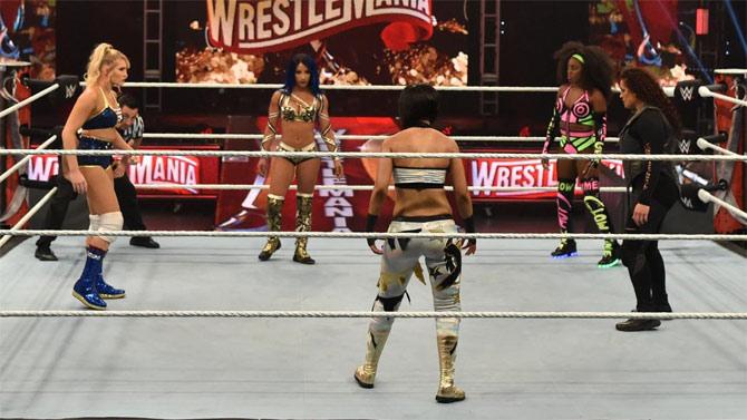 Bayley defended the SmackDown women's title against good friend Sasha Banks, Naomi, Lacey Evans and Tamina in a fatal-five-way match