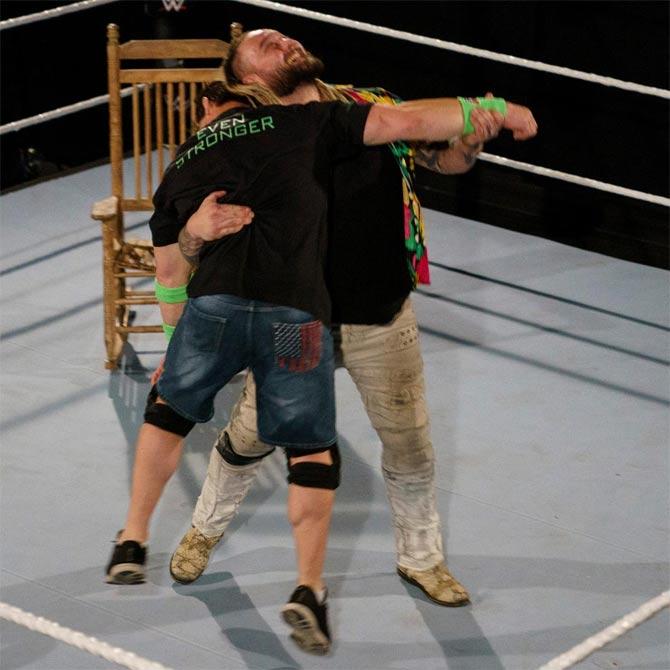 Bray Wyatt then playfully danced away with John Cena, akin to a match at WrestleMania 31 and also hand over a chair for Cena to attack Wyatt with. As Cena went to, Wyatt would once again disappear.