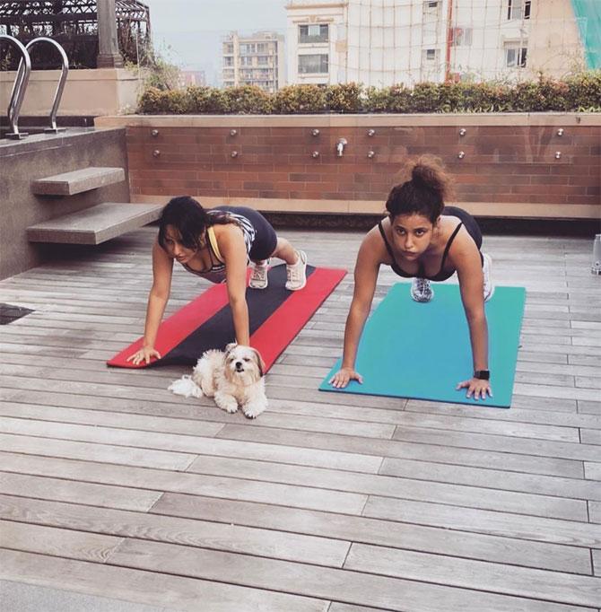 Neha and Aisha are keeping themselves fit by working out at home. They are pretty active on Instagram and keep sharing videos of their workout routines from home. Neha shared this photo of the sisters working out and captioned it: 