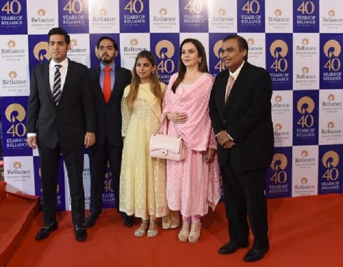 Anant Ambani was seen in a black suit as he posed with his two siblings and parents at the company's 40th AGM in Mumbai on July 21, 2017.