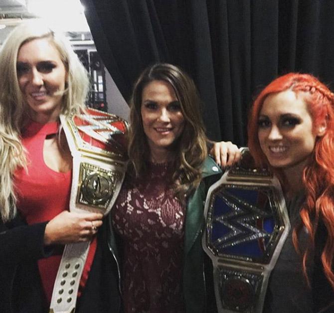 In picture: Lita with former Raw women's champion Charlotte Flair and former SmackDown women's champion Becky Lynch.