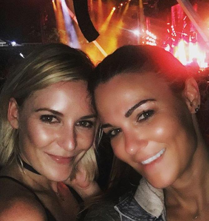 In picture: Lita with co-host of WWE Backstage Renee Young