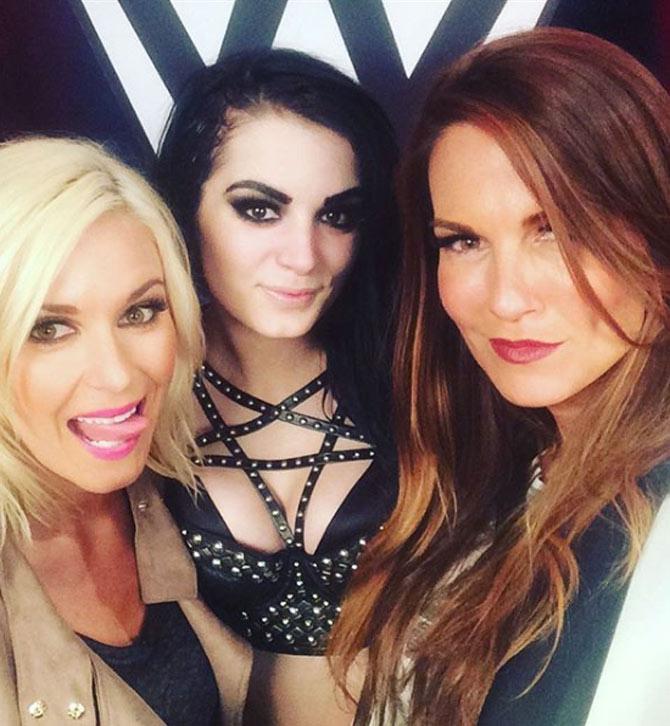 In picture: Lita with WWE Diva's champion Paige