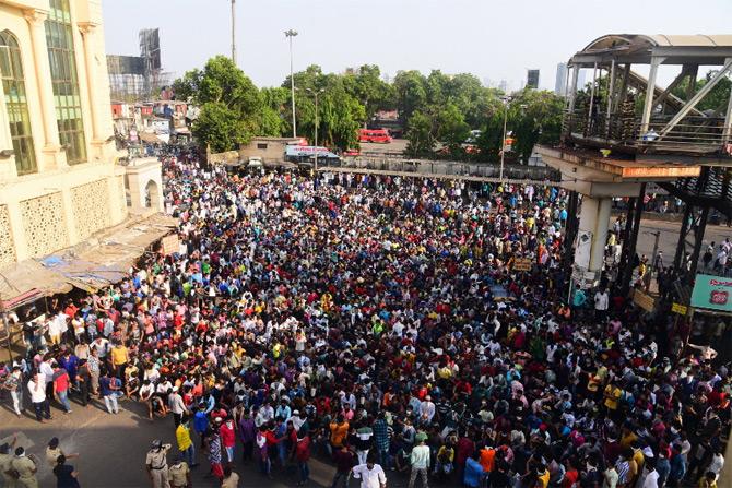 In photo: An aerial view Bandra West Railway Station area where thousands of people has gathered to go back to their native place.