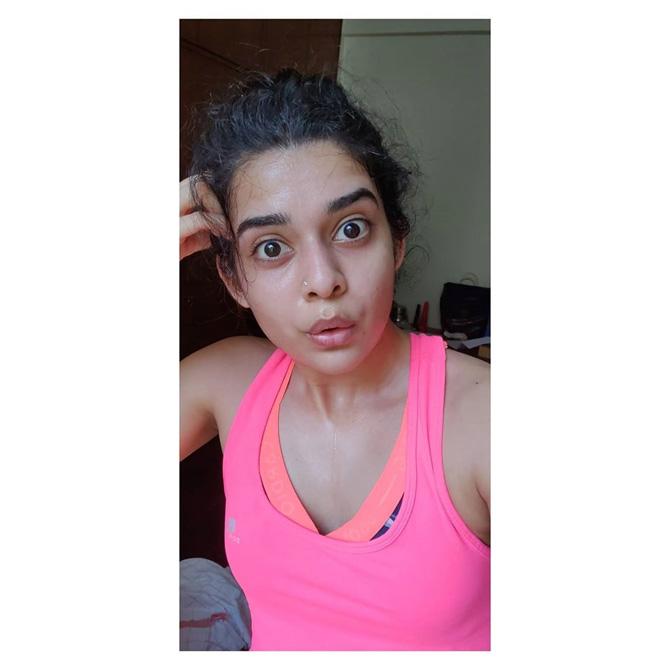 The actress shared a photo of herself apparently having worked out and wearing hot pink gym gear. The expression on her face is priceless, isn't it?
