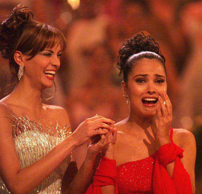 Miss India Lara Dutta (R) reacts after winning the Miss Universe 2000 title in Nicosia, May 13, 2000, as first-runner-up Miss Venezuela Claudia Moreno looks on. Miss Spain Helen Lindes Griffiths was third.