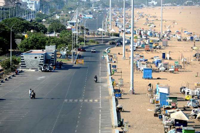 Marina Beach, Chennai
A deserted road next to Marina beach is seen amid the lockdown due to the spread of the COVID-19 novel coronavirus, in Chennai. Tamil Nadu has reported 1683 positive cases so far.