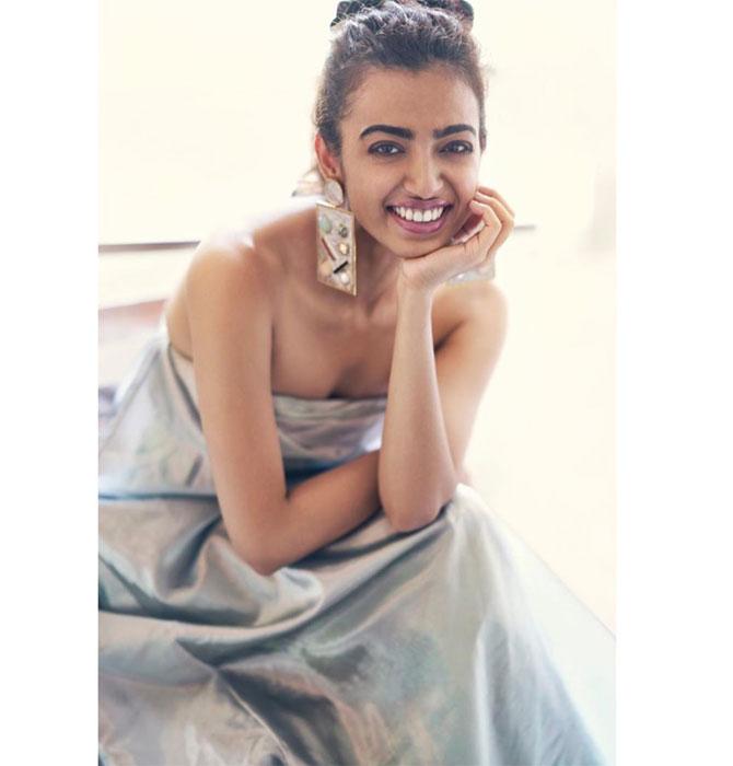 Radhika Apte has also been sharing a few throwback pictures from photoshoots. She shared this one of her all smile is an off-shoulder silver gown.