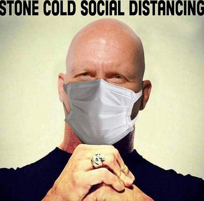 In the wake of the coronavirus pandemic, John Cena shared this photo of Stone Cold Steve Austin wearing a mask and wrote: Stone Cold Social distancing