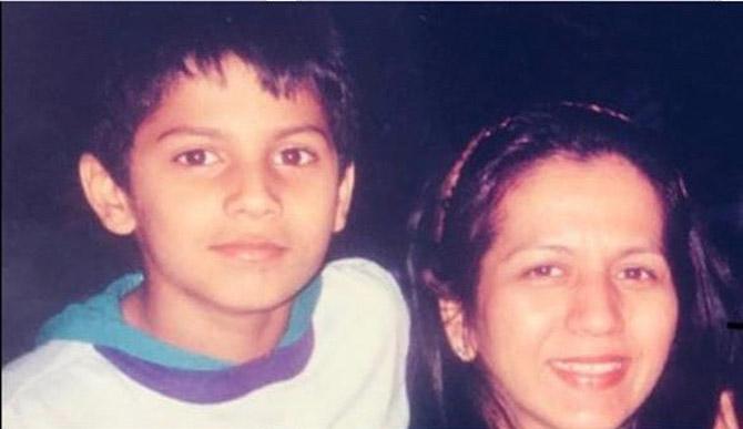 Varun shared this throwback photograph from his childhood. In the image he is seen posing with his mother. 