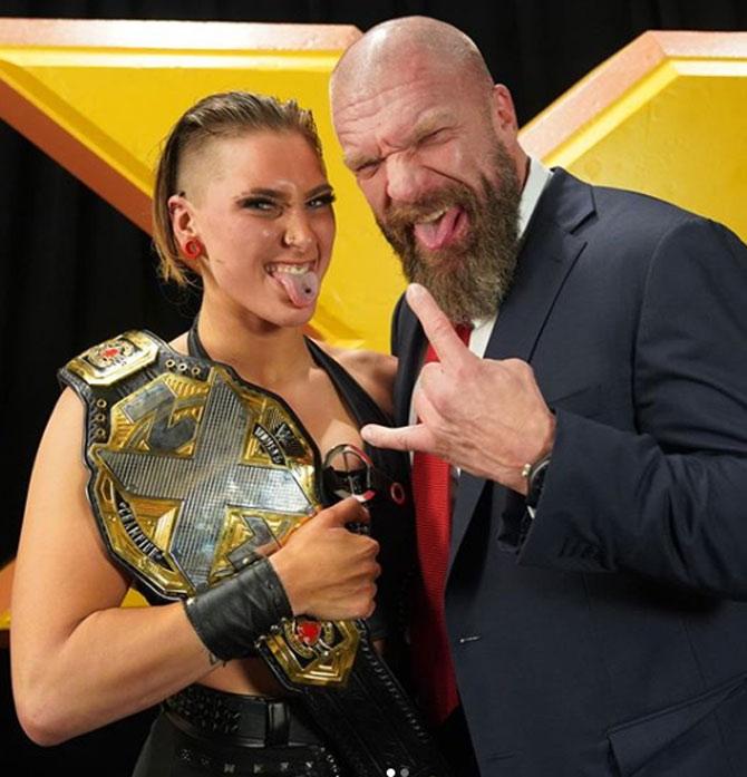 Known for his brilliant business acumen, Triple H later took over the NXT brand and has been widely credited for its development.
Triple H posted this with NXT superstar Rhea Ripley when she won the NXT women's title.
