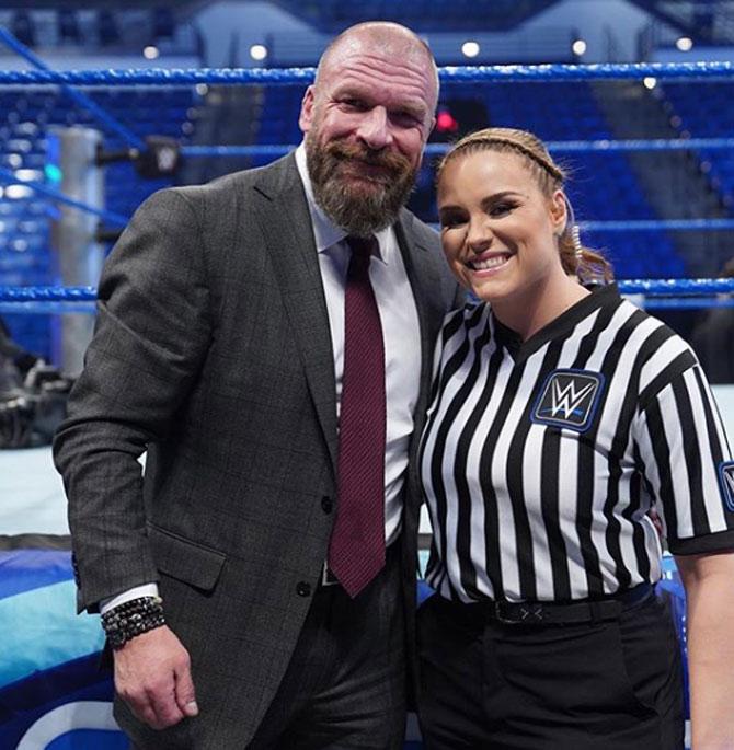 Triple H posted this photo with WWE's first female referee Jessika Carr and wished her: A huge night for @wweladyrefjess and a massive gain for #Smackdown. Welcome to #TeamBlue, incredibly proud of what you’ve accomplished and what you represent. #TheFuture #WeAreNXT