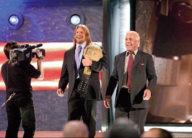 In 2019, Triple H was inducted into the WWE Hall of Fame as part of the D-Generation X faction.
Triple H shared this photo in tribute to WWE Hall of Famer and Evolution member Ric Flair