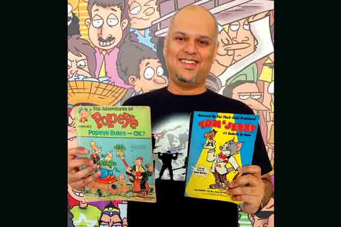 Abhijeet Kini with vintageTom & Jerry and Popeye comics
