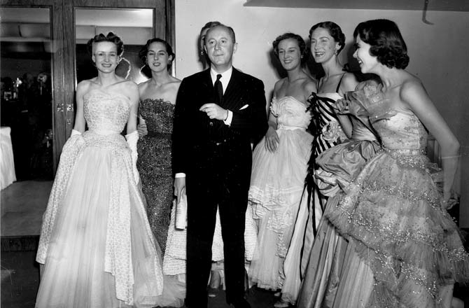 Christian Dior with his models after a fashion parade at the Savoy Hotel, London in 1950. Pic/Getty Images