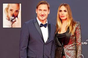 Ex-Italy footballer Totti almost split from wife after she bought a cat