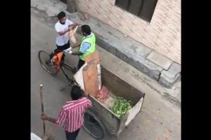 Punjab residents shower flowers on sanitation worker amid lockdown