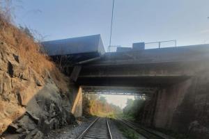 Mumbai: Close shave for trains as truck topples over rail line
