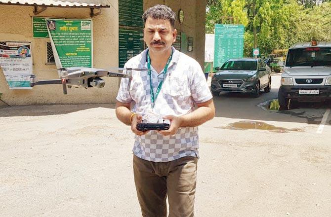 A SGNP official with a drone 