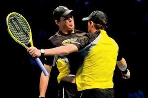 USTA tells players: No chest bumps like Bryan brothers