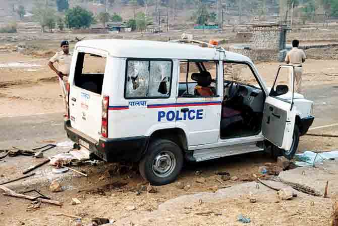 The police car damaged by the mob. PIC/Hanif Patel