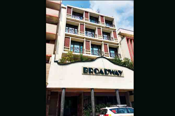 Hotel Broadway on Asaf Ali Road is  marked by a bold curve at the entrance  with classic Deco typography