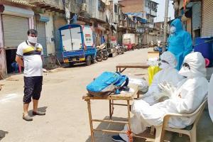Spooked by quarantine, slum residents ditch COVID-19 tests
