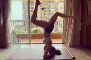 Lockdown diaries: Karishma Tanna aces the inversion yoga pose